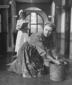 Mama (Irene Dunne) pretends to be a wash woman in the hospital to see her daughter, Dagmar. (LIFE photo by Allan Grant)