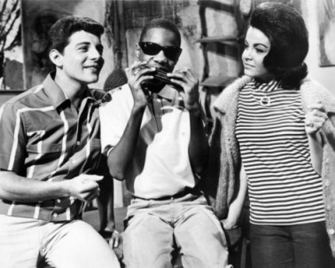 Stevie Wonder, early in his career, with Annette Funicello and Frankie Avalon in "Muscle Beach"