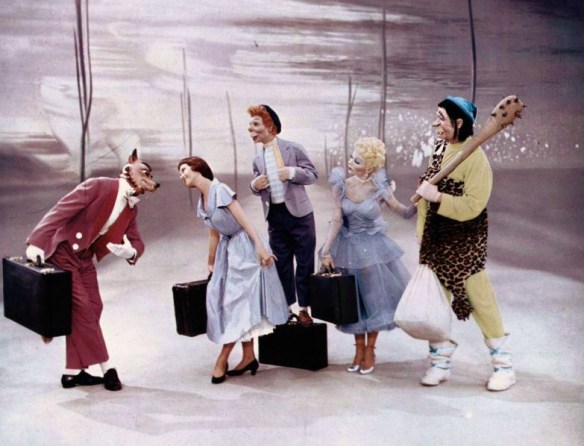 Lili dances with life size puppets during a dream sequence. 