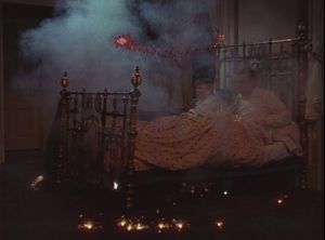 Patti's mischievous little brothers hide fireworks under their bed, and father (Calhern) accidentally lights a fuse. (Comet Over Hollywood/ Screen cap by Jessica P.)