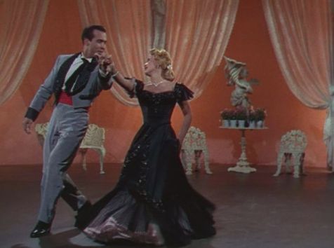 Patti (Powell) dances the tango with Demi (Montalban) in the resort's talent show. (Comet Over Hollywood/ Screen Cap by Jessica Pickens) 