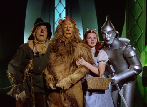 Ray Bolger as the Scarecrow, Bert Lahr as the Cowardly Lion, Judy Garland as Dorothy and Jack Haley as the Tin Man in "The Wizard of Oz" 