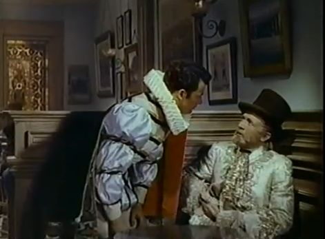 Philippe and Jesse look ridiculous dressed in French costumes (after a masquerade) in a saloon. Comet Over Hollywood/Screen Cap by Jessica P.