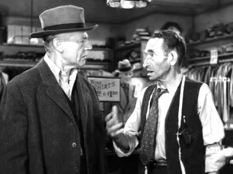 Wealthy Michael O'Connor (Charles Ruggles) exchanges his fancy clothes to dress like he is homeless.