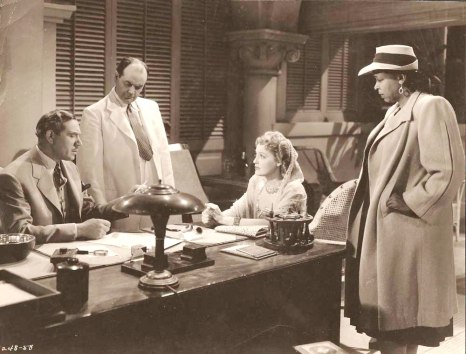 Jeanette MacDonald is worried Robert Young has fallen into hands of spies. Also pictured- Ethel Waters and Rhys Williams.