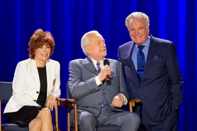 Jill St. John and Robert Wagner celebrating the 20th Anniversary of TCM with Robert Osborne during the Ask Robert Event at The Montalban Theatre on Friday at the 2014 TCM Classic Film Festival In Hollywood, California. 4/11/14  PH: Mark Hill