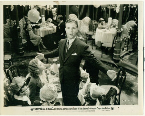 Dick Powell in a publicity still for "Happiness Ahead."