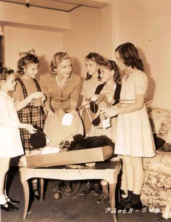 Madeleine Carroll looking after war orphans in her French Chateau 