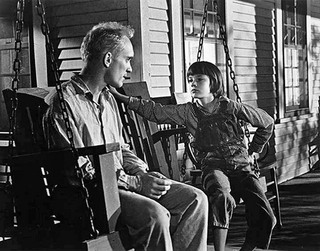 Scout with Boo Radley in "To Kill a Mockingbird." 
