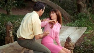 Duke tries to seduce Tina, played by Laurie Mock. 