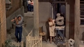 Jesslyn Fax plays the sculpting neighbor. 