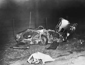 The wrecked remains of James Dean's Porsche 550 Spyder at the site of the accident. The 24-year-old film star was killed on the evening of September 30th when his car collided with a college student's automobile at an intersection 28 miles east of Paso Robles, California. 