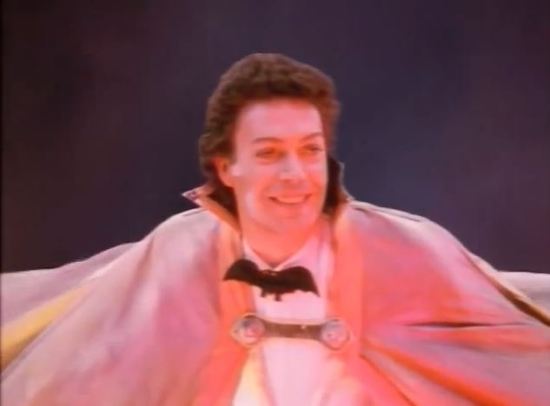 Tim Curry plays the Grand Wizard. 