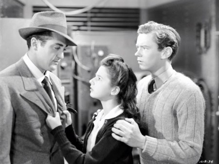 Virginia Weidler and Ray McDonald plead for help from a gangster in "Born to Sing." 