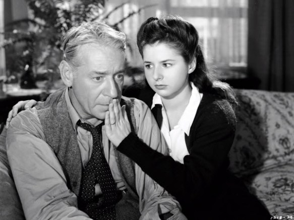Virginia Weidler with her father, played by Henry O'Neill, after he tried to commit suicide in "Born to Sing." 