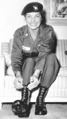 Martha Raye in Vietnam in her signature Green Beret and combat boots. 