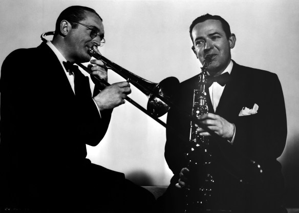 Tommy Dorsey playing the trombone and Jimmy Dorsey playing the saxophone. 