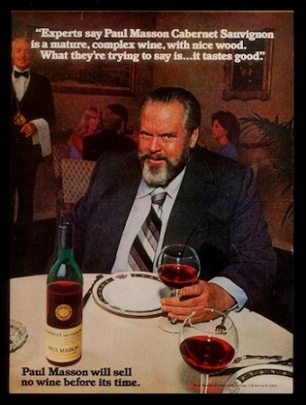 Welles in a printed Paul Masson advertisement.
