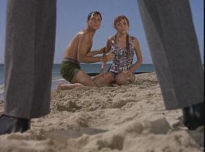 Moondoggie (Darren) catches Eddie (Callan) and Gidget (Walley) together.