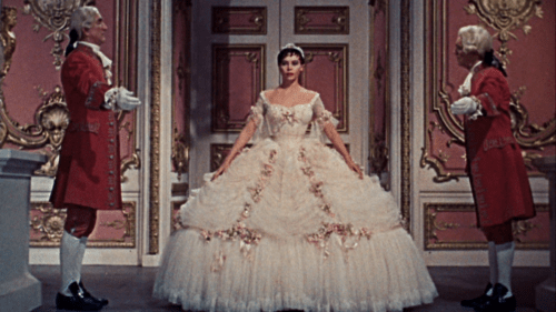 Leslie Caron as Cinderella arriving at the ball in 