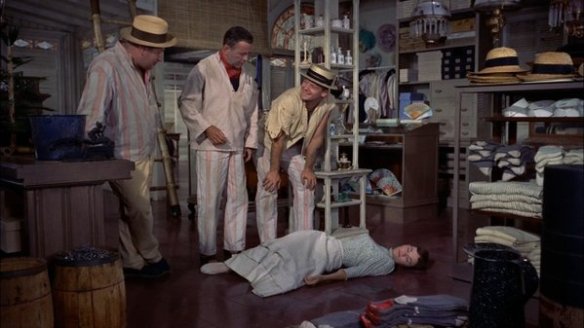 The convicts help Isabella after she faints.