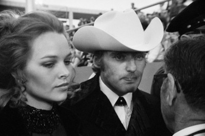 Actor-Director Dennis Hopper with fiancee Michelle Phillips shown as they arrived for the Academy Awards. April 7, 1970, Hollywood. --- Image by © Bettmann/CORBIS