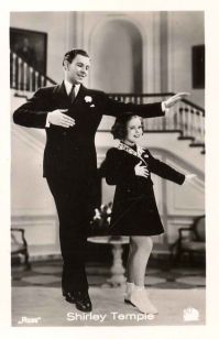 George Murphy and Shirley Temple in "Little Miss Broadway."