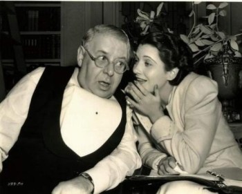 S.Z. Sakall and Kay Francis on the set of "It's a Date" 