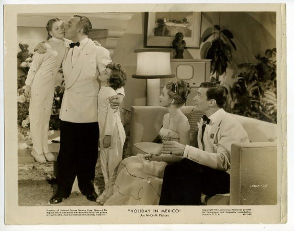 Jose Iturbi with his grandchildren in "Holiday in Mexico."