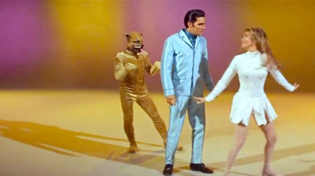 The dog even dances in the next number