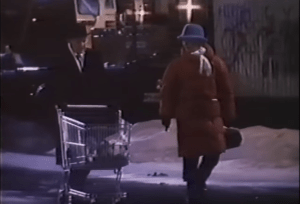 Howard and Young serving the homeless in "Christmas Eve" 