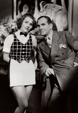 Ruby Keeler and Al Jolson in "Go Into Your Dance" together. This was the first and only film they starred in together. The two were married from 1928 to 1939. 