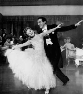 Sonja Henie doesn't quite fit into this ballroom dancing performance with Cesar Romero. 