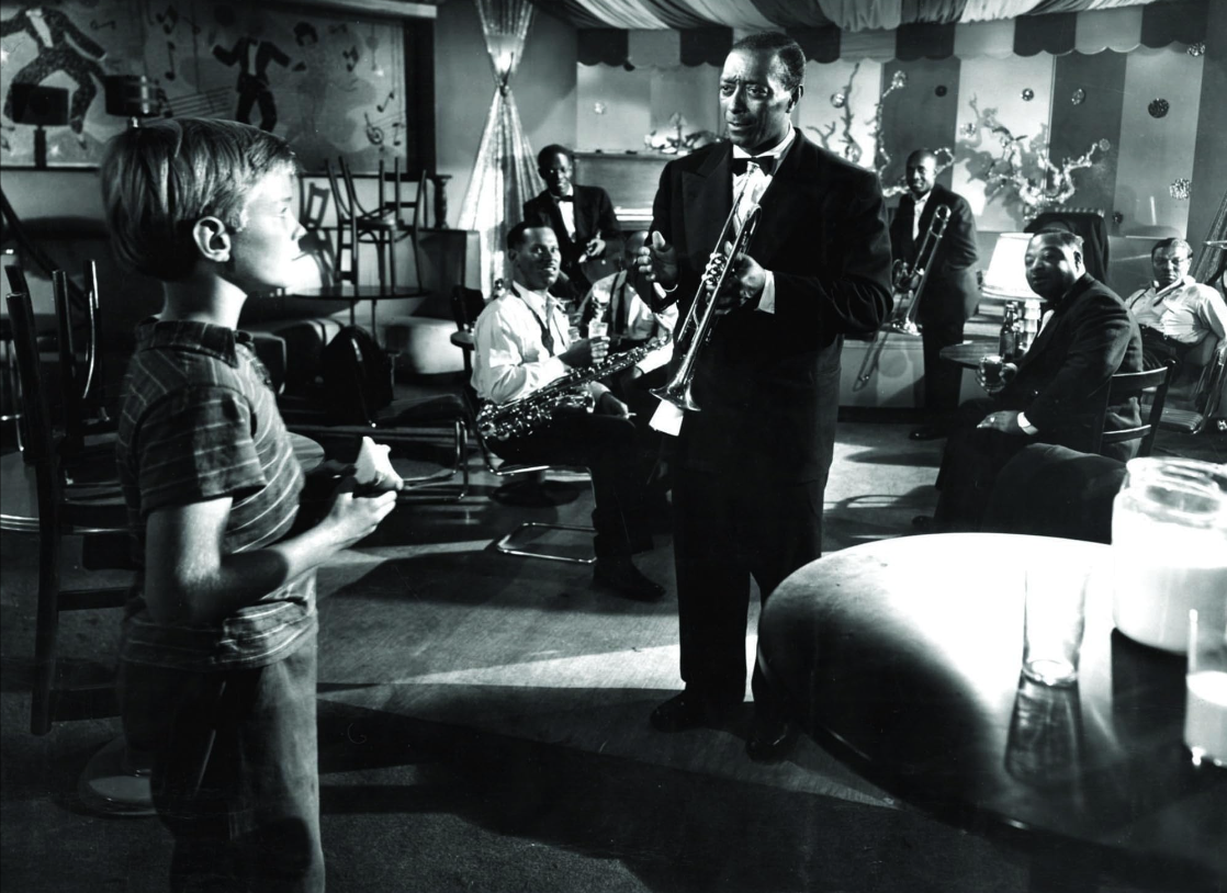 young man with a horn